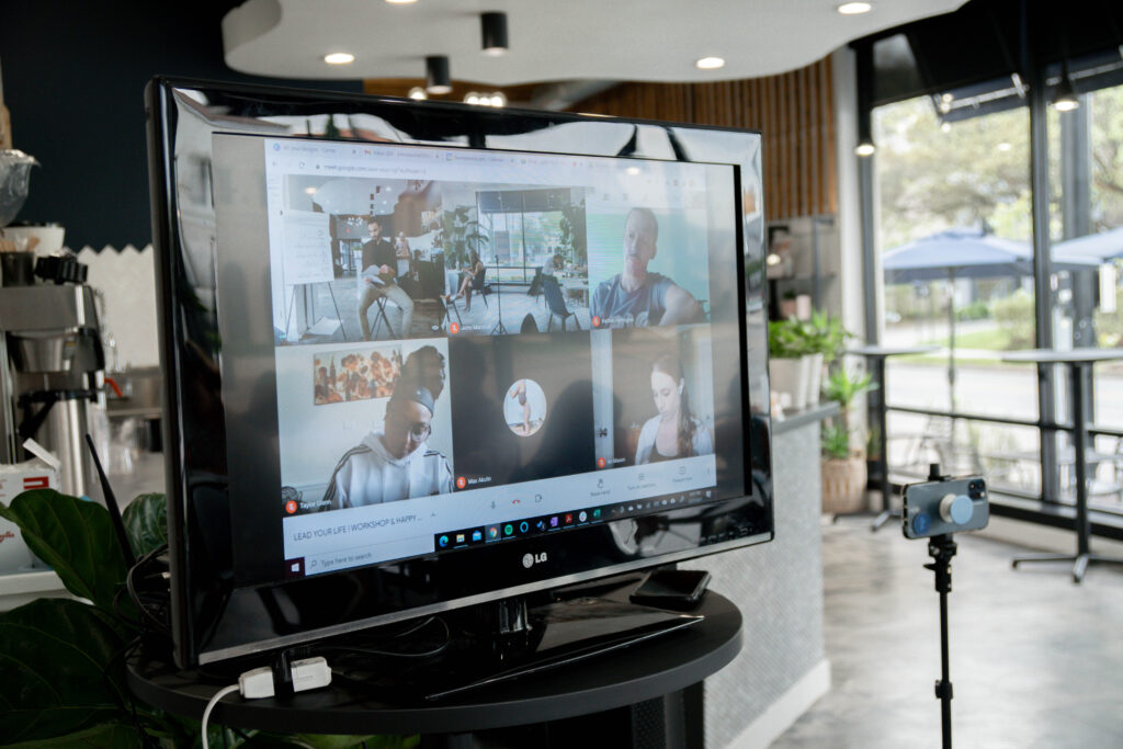 View of online participants during a hybrid development workshop.