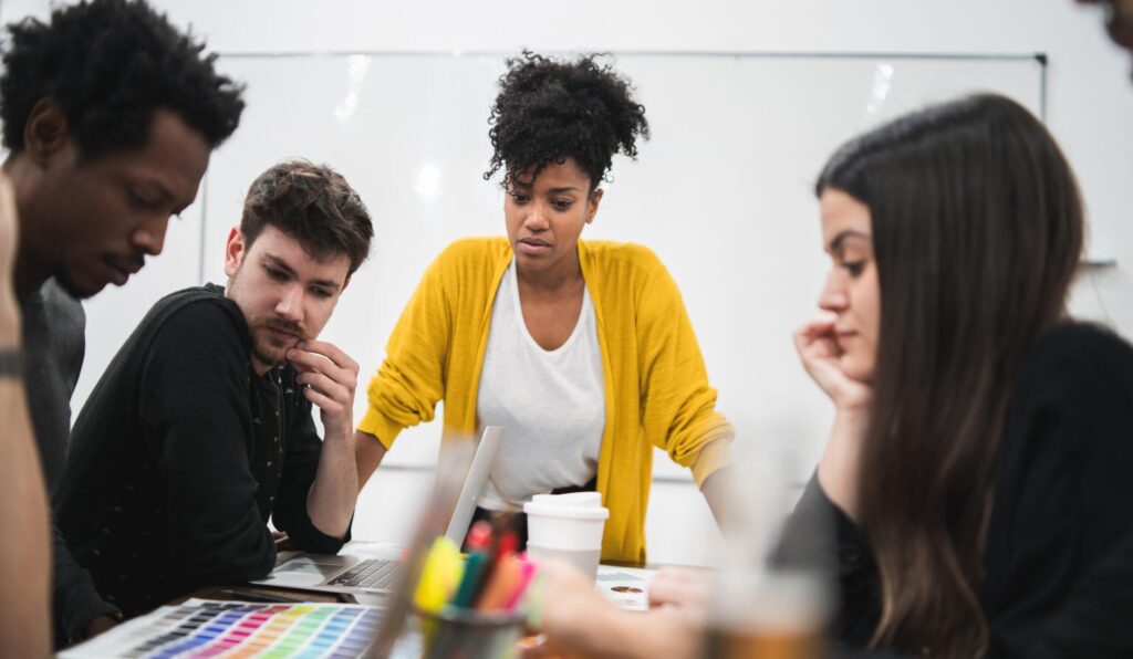 Woman manager leading a brainstorming session with her team