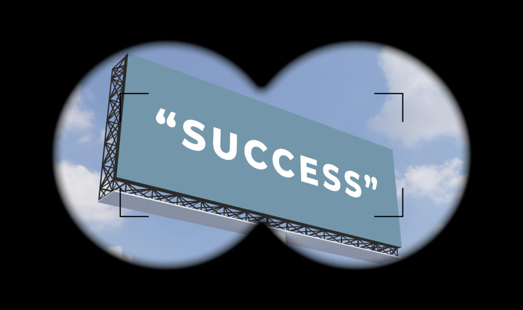 a billboard with the word success on it while being looked through a binoculars