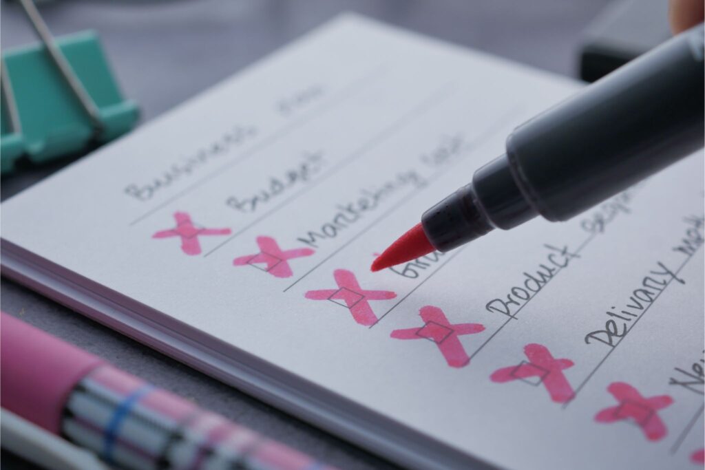 Featured items check list with red crosses drawn through the items