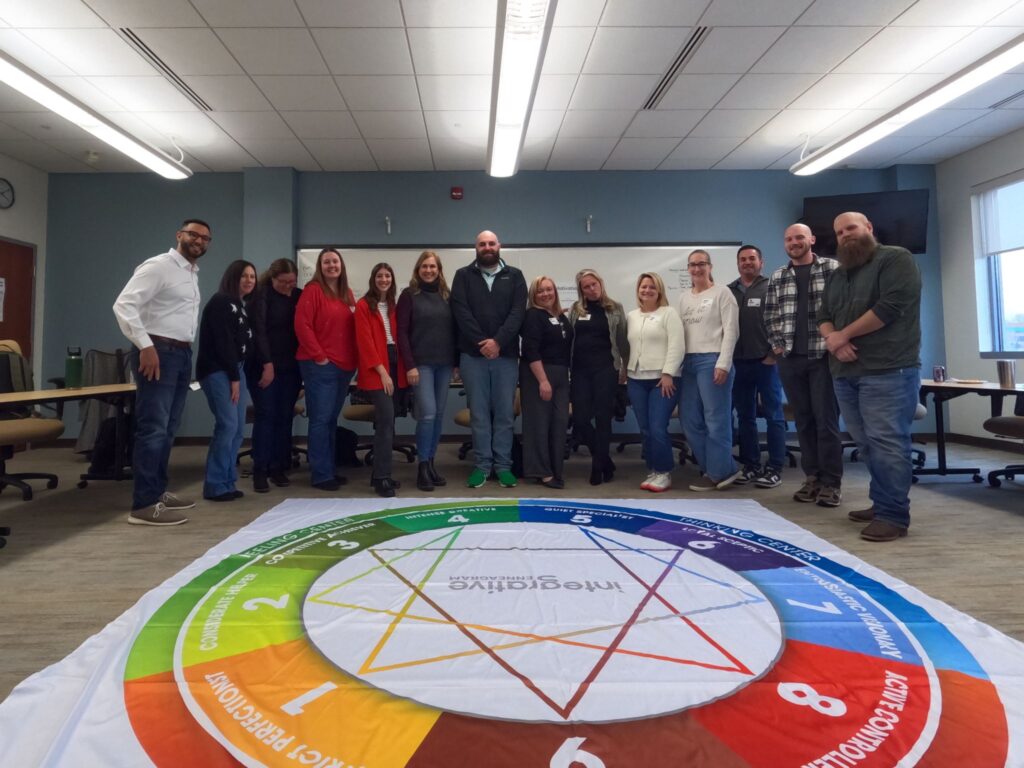 A group photo with a company leadership team following an iEQ9 Assessment group debrief workshop.