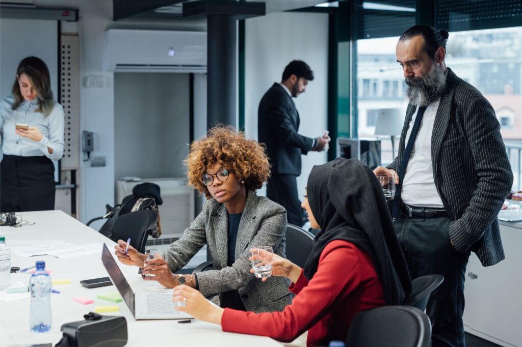 Multi-racial business partners communicating at a brainstorming session
